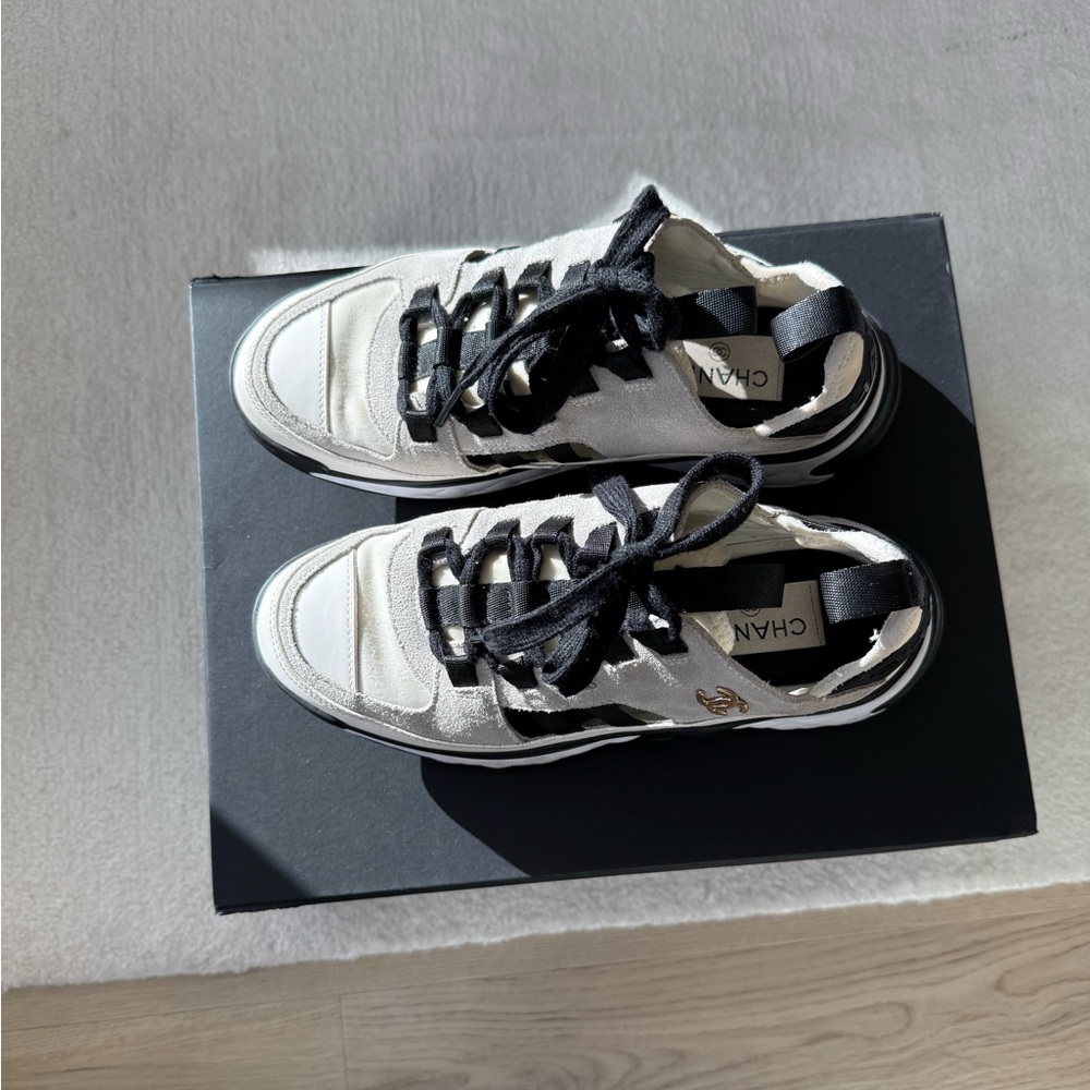 CHANEL Classic Sneakers in Ivory/White
Calfskin Suede + Gold Chanel Logo - Picture 3 of 9